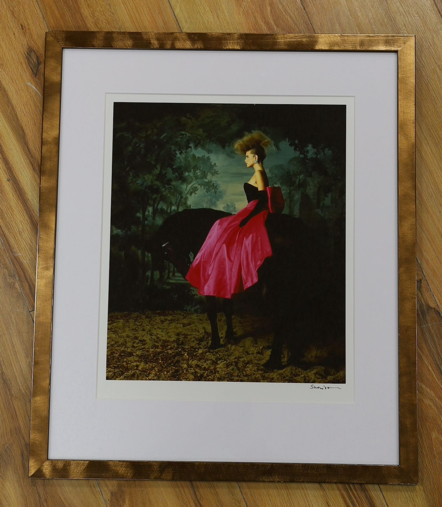 Lord Snowdon (1930 - 2017), chromogenic print, Model riding a black horse, signed, 35 x 30cm